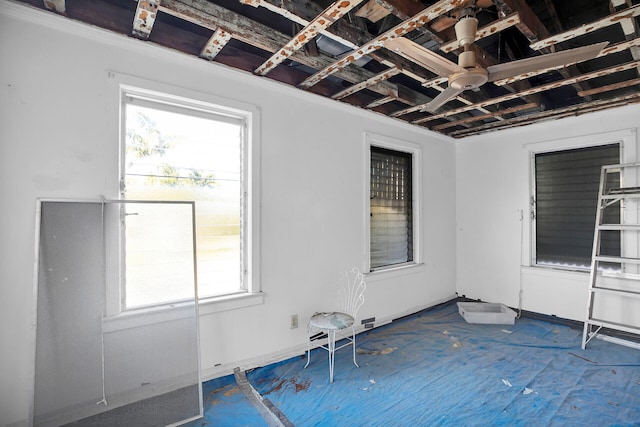 view of patio featuring ceiling fan