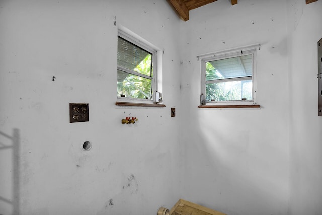 clothes washing area with laundry area and plenty of natural light