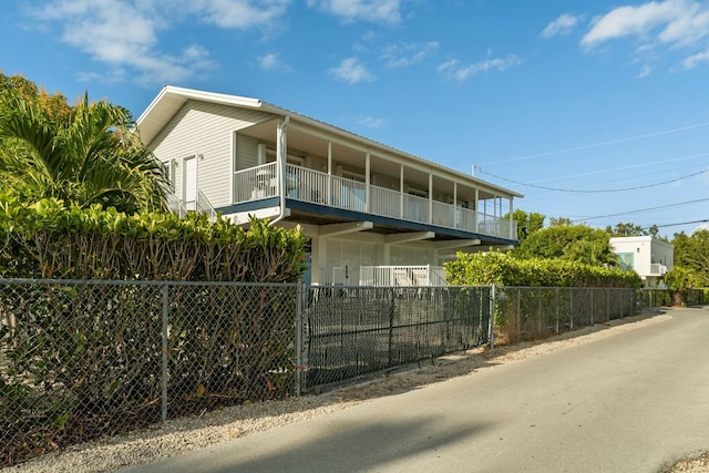 view of property exterior featuring a balcony