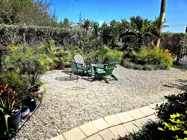 view of yard with a patio and fence