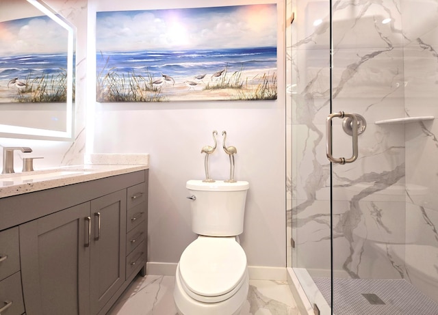 full bathroom featuring a marble finish shower, baseboards, toilet, marble finish floor, and vanity