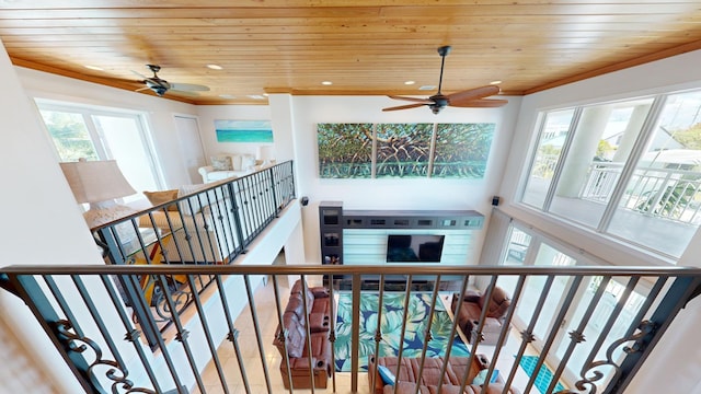 stairs with ornamental molding and wooden ceiling