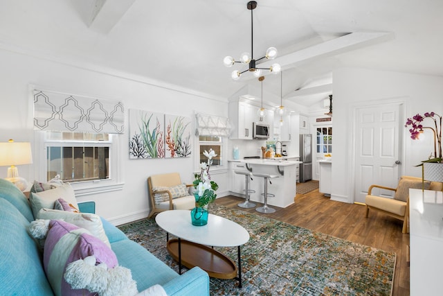 321 Julia St, Key West, FL 33040 - living area featuring vaulted ceiling, dark wood finished floors, and a chandelier