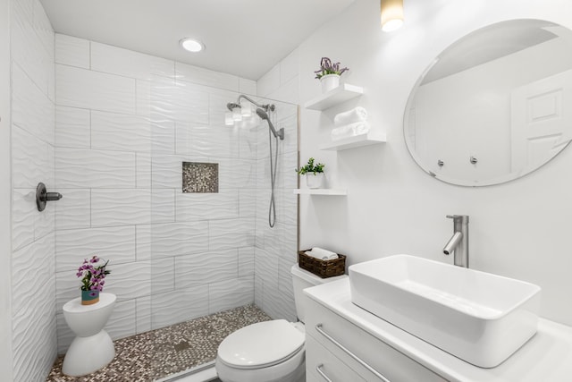 321 Julia St, Key West, FL 33040 - full bathroom with vanity, a tile shower, and recessed lighting