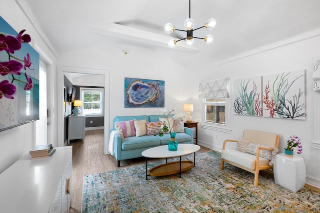 321 Julia St, Key West, FL 33040 - living area with lofted ceiling, wood finished floors, and a chandelier