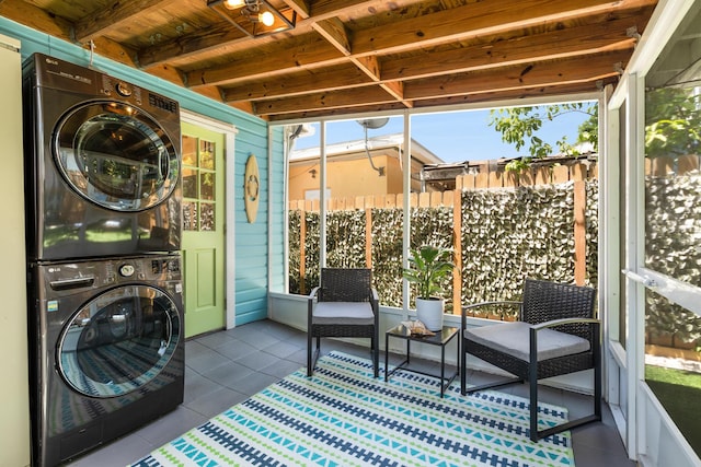 321 Julia St, Key West, FL 33040 - sunroom with estacked washer and dryer and healthy amount of natural light