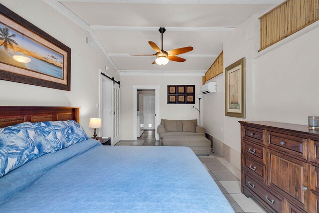 tiled bedroom featuring a barn door, a wall mounted air conditioner, and ceiling fan