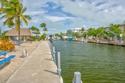 dock area featuring a gazebo and a water view