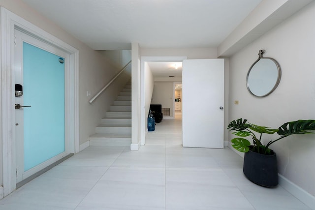 interior space featuring light tile patterned floors