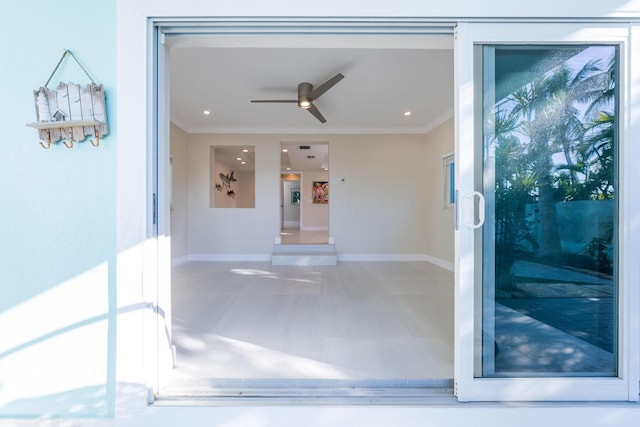 property entrance featuring ceiling fan