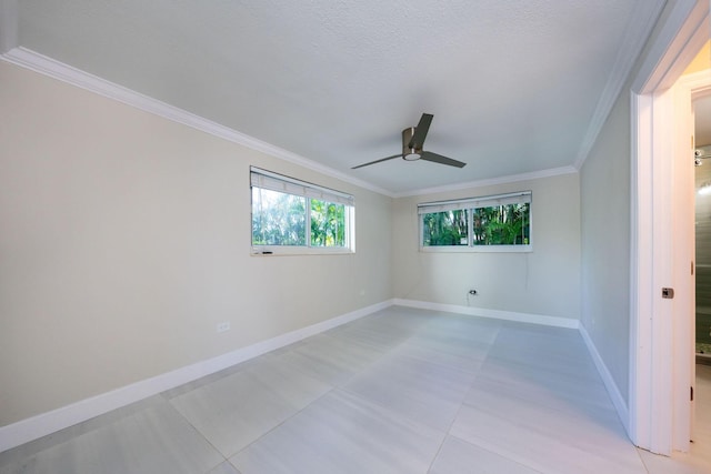 empty room with crown molding, ceiling fan, and a textured ceiling