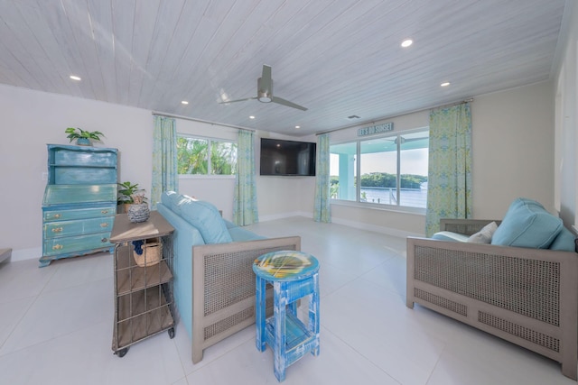 living room with plenty of natural light, light tile patterned floors, and wooden ceiling