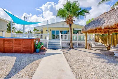 view of front of house featuring a gazebo and a swimming pool side deck