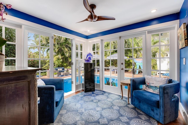 living area featuring recessed lighting, french doors, and ceiling fan