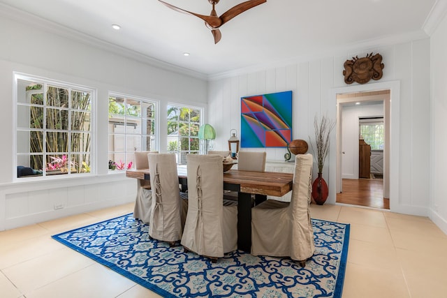 tiled dining space with ornamental molding, a wealth of natural light, and recessed lighting