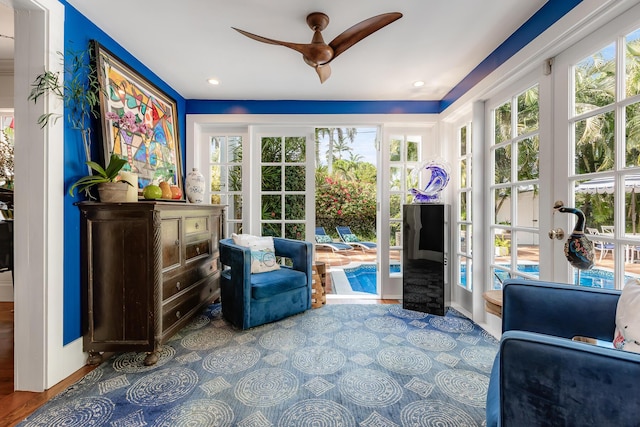 sitting room featuring ceiling fan and recessed lighting