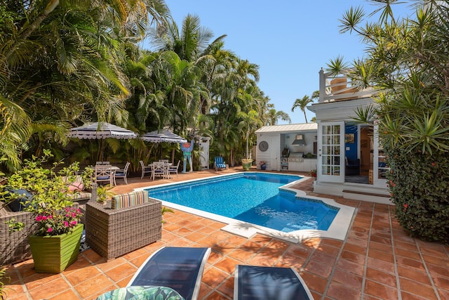 pool featuring a patio area