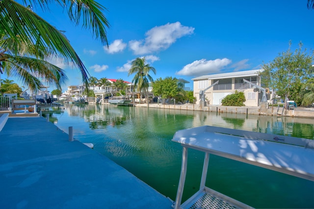 dock area featuring a water view