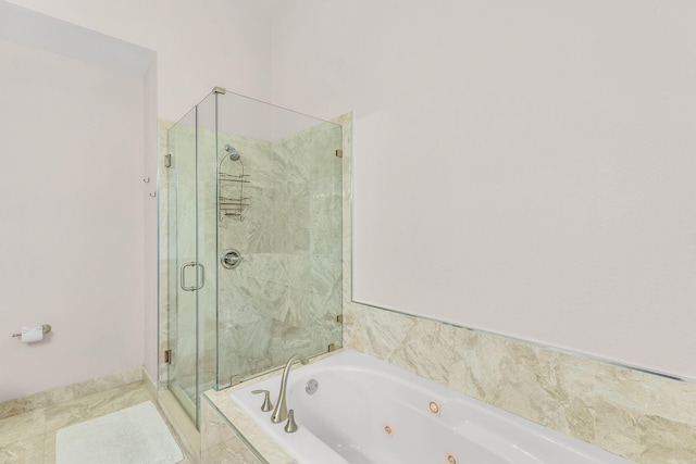 97501 Overseas Hwy Unit 705, Key Largo, FL 33037 - full bath featuring a marble finish shower and a tub with jets