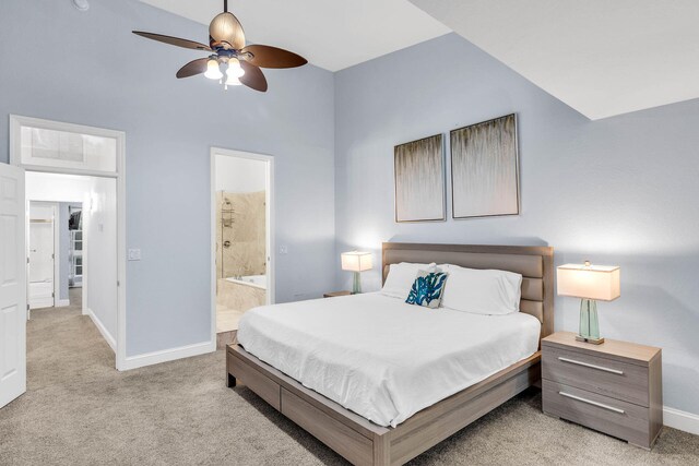 97501 Overseas Hwy Unit 705, Key Largo, FL 33037 - bedroom featuring a ceiling fan, baseboards, connected bathroom, and light colored carpet