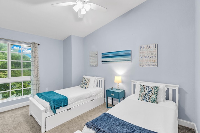 97501 Overseas Hwy Unit 705, Key Largo, FL 33037 - carpeted bedroom with vaulted ceiling, a ceiling fan, and baseboards