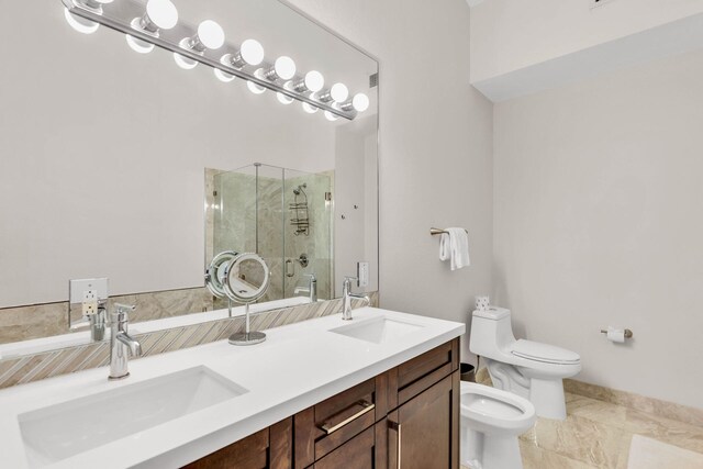 97501 Overseas Hwy Unit 705, Key Largo, FL 33037 - full bath featuring a bidet, a sink, toilet, and a shower stall