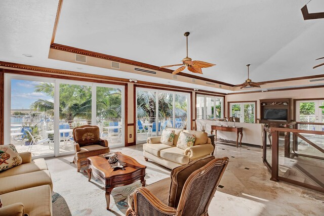 97501 Overseas Hwy Unit 705, Key Largo, FL 33037 - living area with ceiling fan, visible vents, a raised ceiling, and crown molding