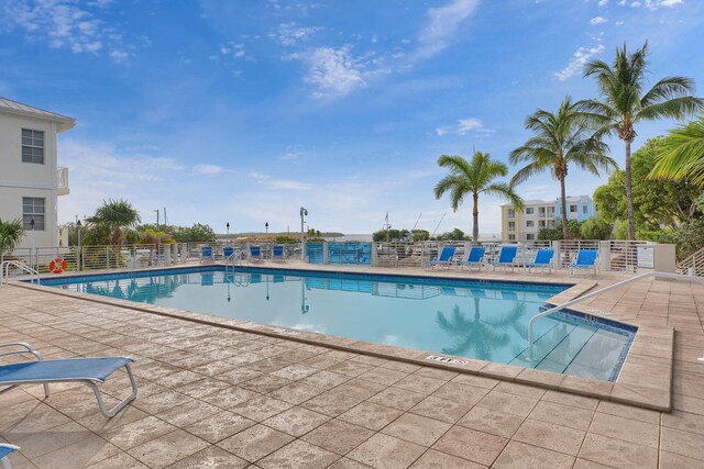 97501 Overseas Hwy Unit 705, Key Largo, FL 33037 - community pool with fence and a patio