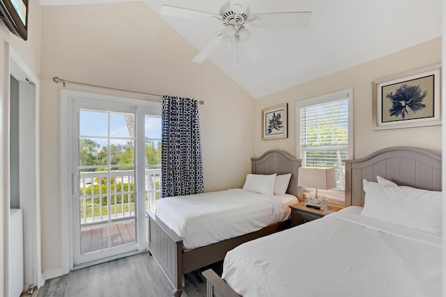 bedroom with ceiling fan, lofted ceiling, access to exterior, and light hardwood / wood-style floors