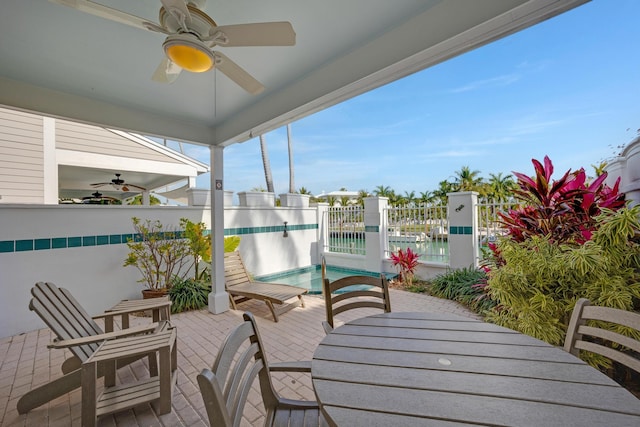 exterior space with a patio and ceiling fan