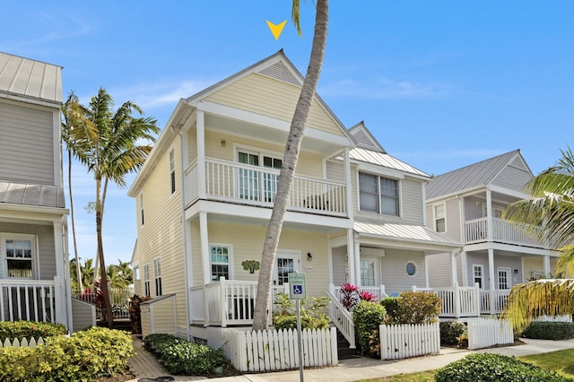 view of front of home with a balcony