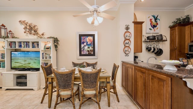101 Front St Unit 8, Key West, FL 33040 - dining space featuring light tile patterned flooring, ornamental molding, and ceiling fan