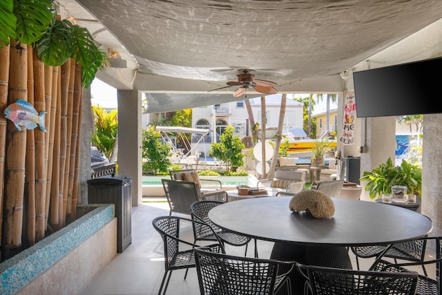 22 Floral Ave, Key Haven, FL 33040 - view of patio / terrace with ceiling fan and a pool