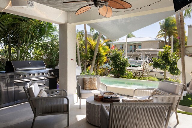 22 Floral Ave, Key Haven, FL 33040 - view of patio with ceiling fan, an outdoor living space, exterior kitchen, and area for grilling