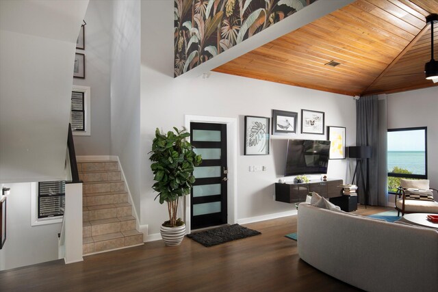 22 Floral Ave, Key Haven, FL 33040 - living room featuring dark hardwood / wood-style flooring, high vaulted ceiling, and wooden ceiling