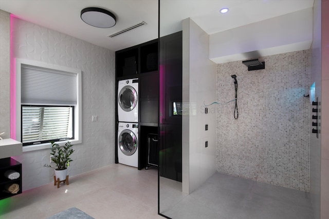 22 Floral Ave, Key Haven, FL 33040 - clothes washing area with stacked washing maching and dryer