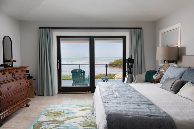 22 Floral Ave, Key Haven, FL 33040 - tiled bedroom with a water view and access to exterior