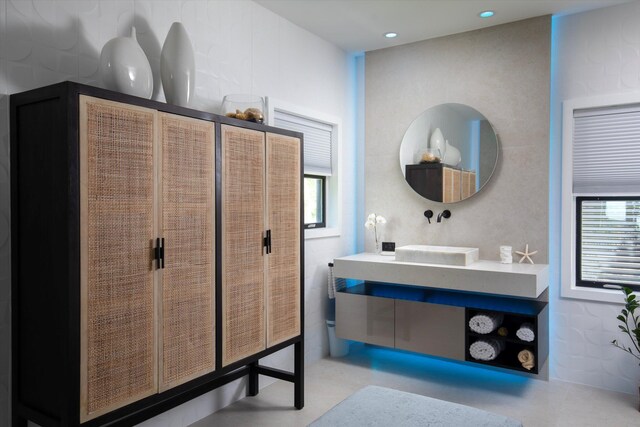 22 Floral Ave, Key Haven, FL 33040 - bathroom with vanity and a healthy amount of sunlight