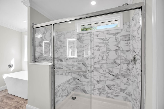 bathroom with wood-type flooring, plus walk in shower, and ornamental molding