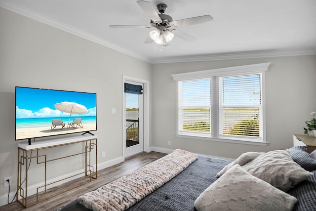 bedroom featuring access to exterior, crown molding, ceiling fan, and wood-type flooring