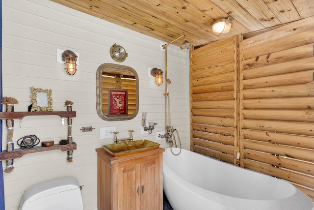 1001 United St Unit B, Key West, FL 33040 - bathroom featuring a soaking tub, vanity, log walls, and wooden ceiling