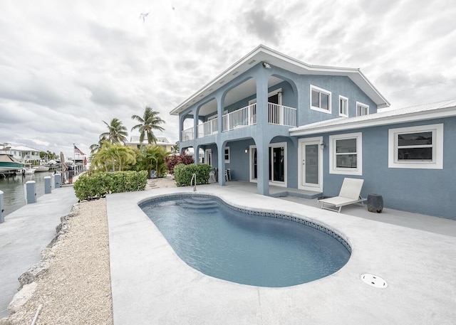 pool featuring a patio