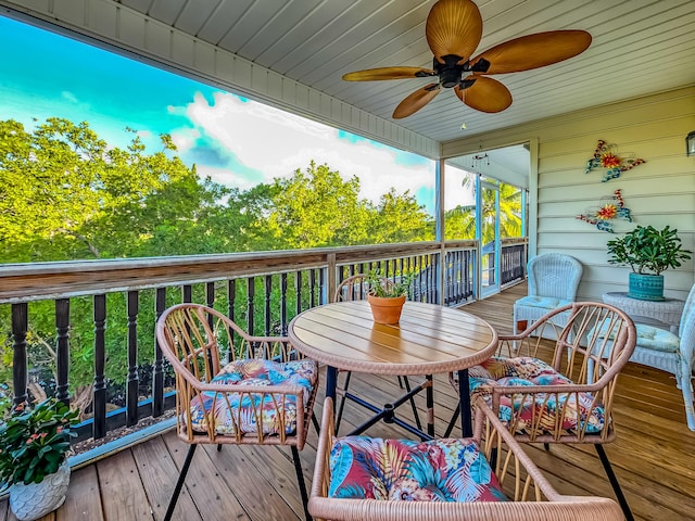 wooden terrace with ceiling fan