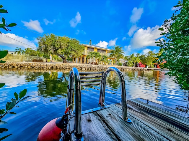 dock area featuring a water view