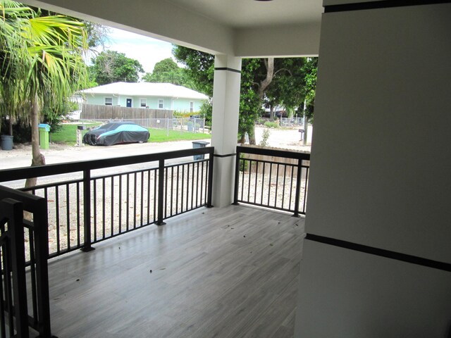 wooden deck featuring area for grilling