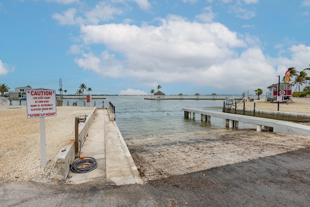 view of dock with a water view