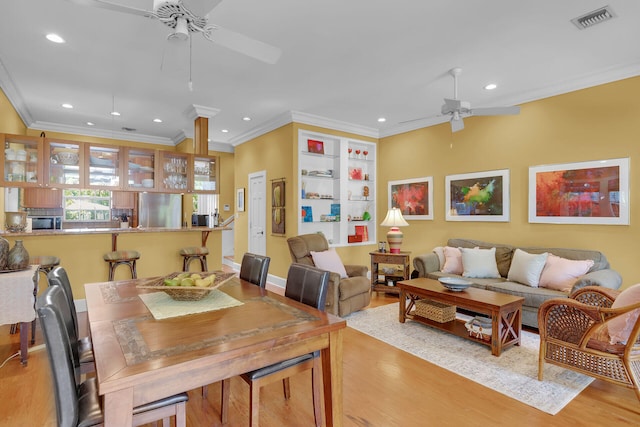 dining area featuring a ceiling fan, visible vents, recessed lighting, and light wood-type flooring