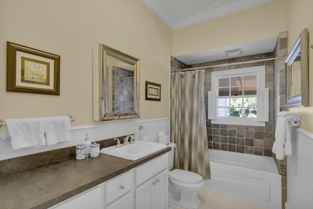 full bath with vanity, ornamental molding, visible vents, tile patterned flooring, and wainscoting