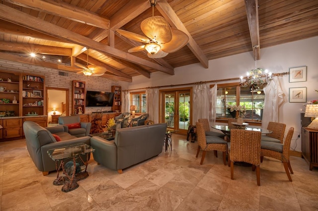 living room featuring vaulted ceiling with beams, wood ceiling, ceiling fan with notable chandelier, and french doors