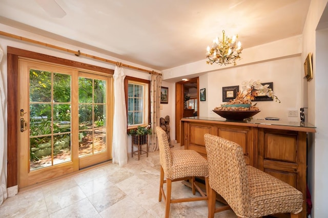 dining space featuring a chandelier